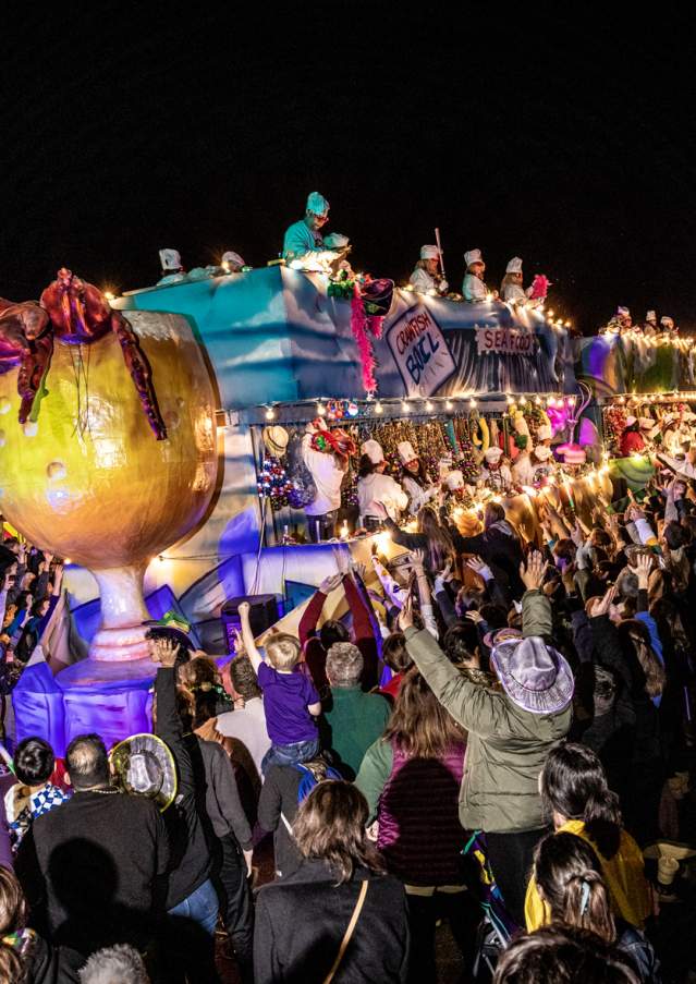 A crawfish-themed float in the Krewe of Eve Mardi Gras parade