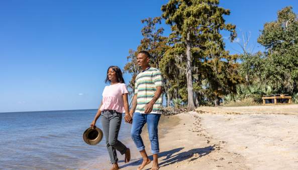 Couple walking on the beach