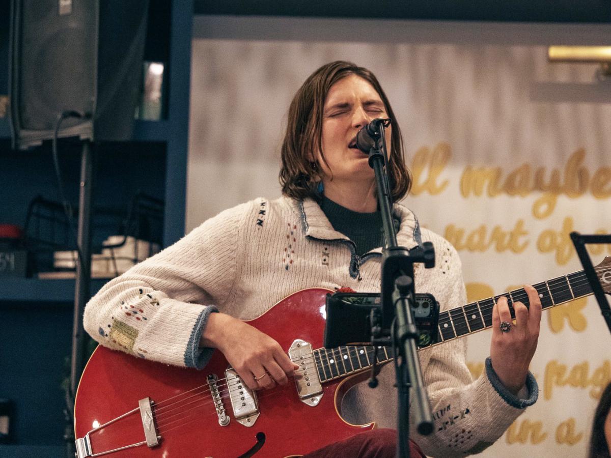 A singer-guitarist performs at Haven Coffee and Cocktails in Covington.