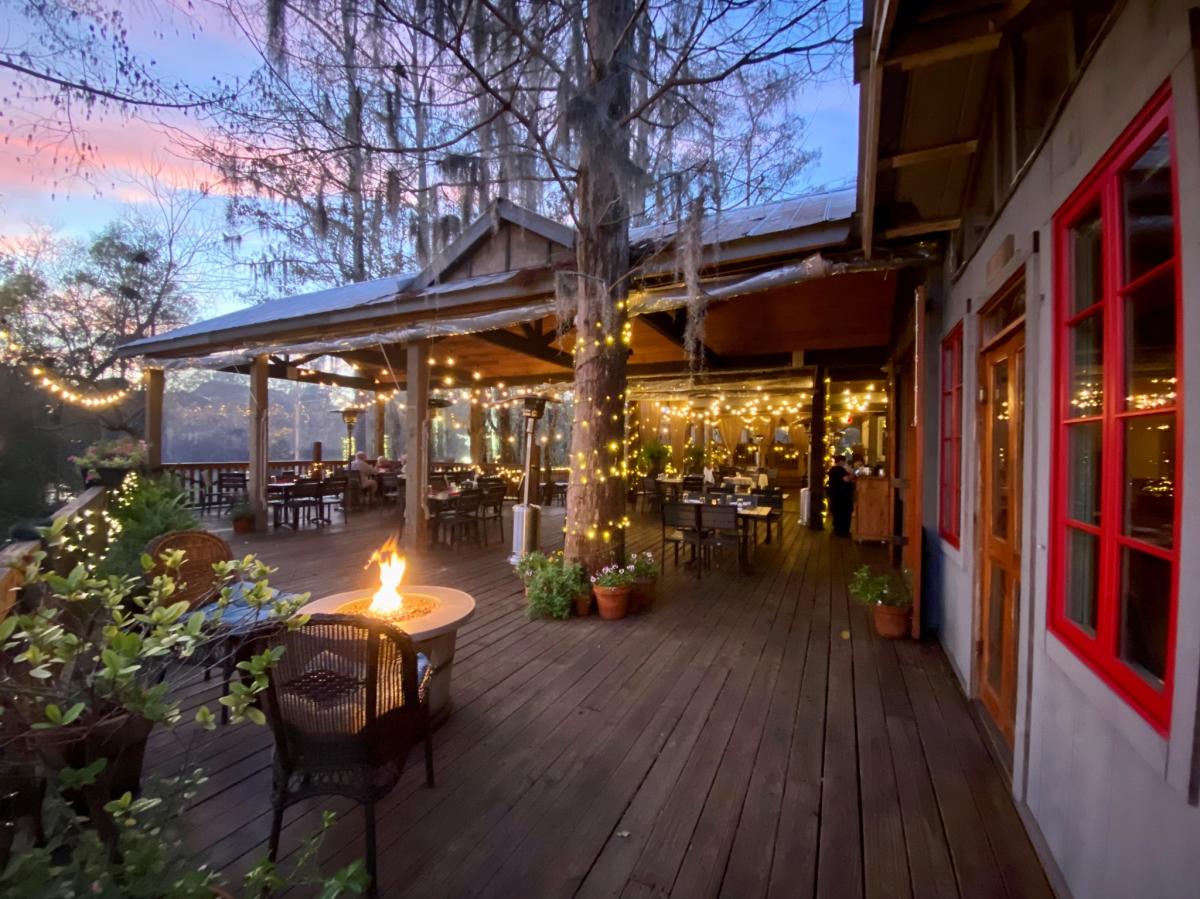 Palmettos on the Bayou patio at dusk