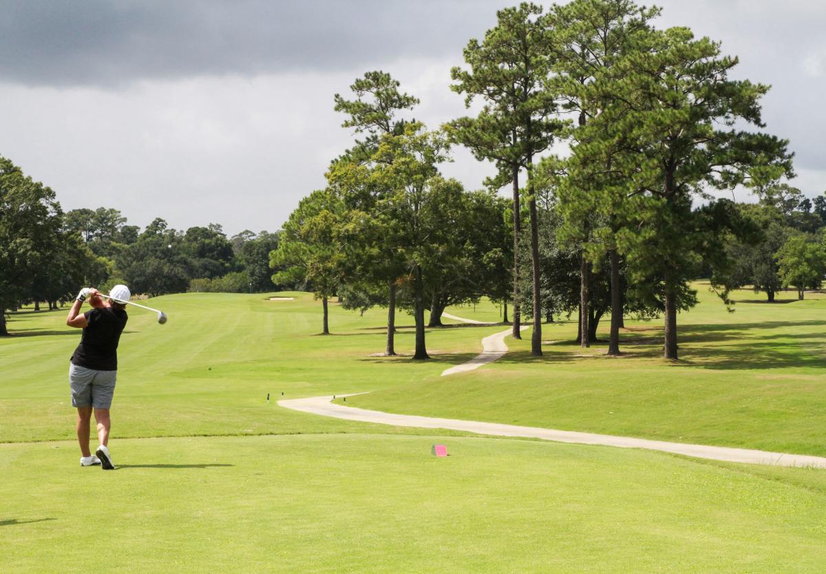 Tchefuncte country club fairway female golfer