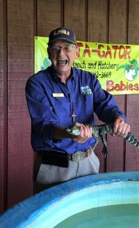 Man at Insta-Gator Ranch & Hatchery, Covington