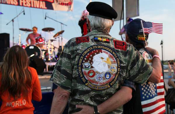 Military Veteran, Couple at Festival